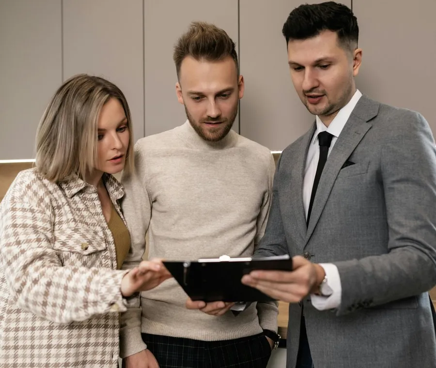 The Zen Living team reviewing a property plan together