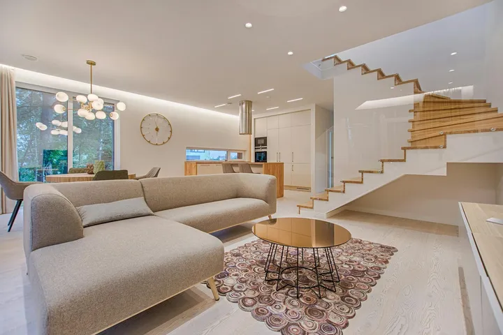 A light, modern living room staged for short-let guests
